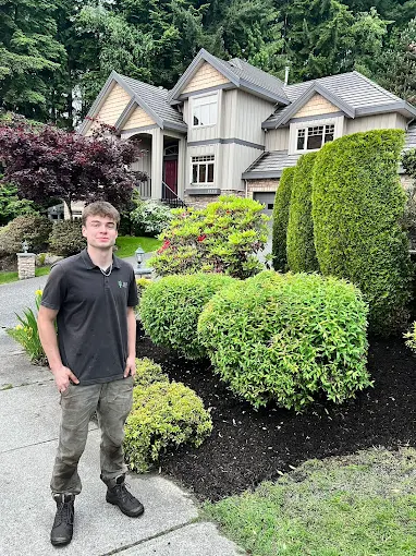 Pinnacle Ridge Contracting team on a recently finished landscaping project